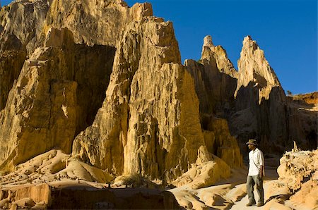 simsearch:841-03058523,k - Man walking through strange looking sandstone formations, Ankarafantsika National Park, Madagascar, Africa Stock Photo - Rights-Managed, Code: 841-03676450