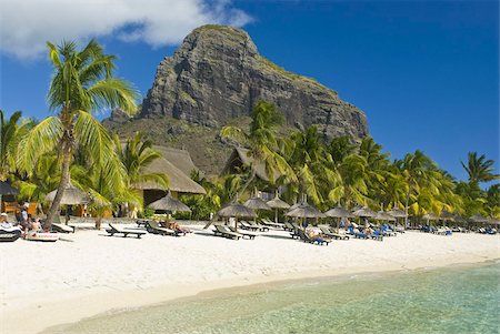 White sand beach of the five star hotel Le Paradis, with Le Morne Brabant in the background, Mauritius, Indian Ocean, Africa Stock Photo - Rights-Managed, Code: 841-03676699