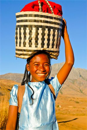 Young friendly girl smiling at the camera, Andringitra National Park, Madagascar, Africa Stock Photo - Rights-Managed, Code: 841-03676769