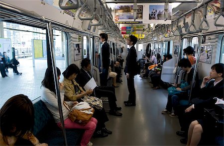 simsearch:841-03676975,k - Passengers riding aboard the Yamanote loop line train that encircles greater metropolitan Tokyo, Japan, Asia Stock Photo - Rights-Managed, Code: 841-03676980