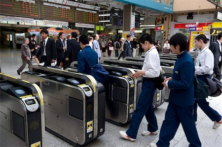 Passengers passing through automatic ticket wickets upon entering the JR Ueno railway station in Tokyo, Japan, Asia Stock Photo - Rights-Managed, Code: 841-03676982