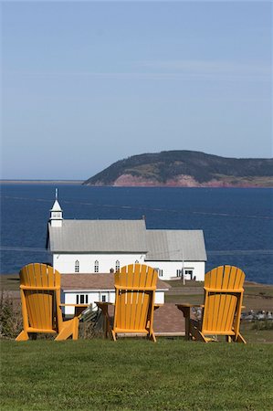 simsearch:841-02946968,k - Yellow Adirondack chairs overlooking church on an island in the Gulf of St. Lawrence, Iles de la Madeleine (Magdalen Islands), Quebec, Canada, North America Stock Photo - Rights-Managed, Code: 841-03677036