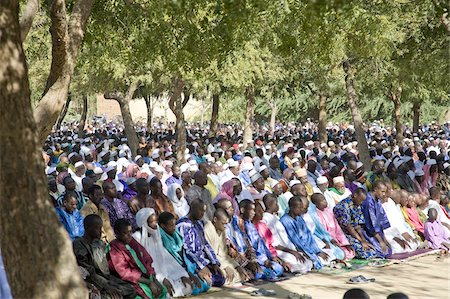 Tabaski, a religious festival held throughout Mali when hundreds of men and boys worship outdoors, Djenne, Mali, West Africa, Africa Fotografie stock - Rights-Managed, Codice: 841-03677132