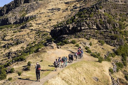 portugal tourist places - Walkers stride out on a marked footpath on the Pico Ruivo on the island of Madeira, Portugal, Europe Stock Photo - Rights-Managed, Code: 841-03677201