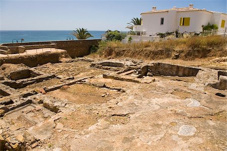 faro - A modern apartment overlook the Roman ruins (the Ruinas Romanas da Luz) at Luz in Lagos, Algarve, Portugal, Europe Stock Photo - Rights-Managed, Code: 841-03677215