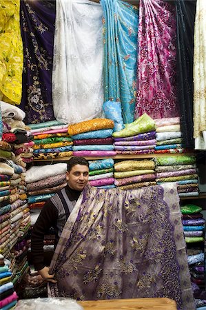Fabric trader in his shop, Oujda, Oriental Region, Morocco, North Africa, Africa Stock Photo - Rights-Managed, Code: 841-03677278