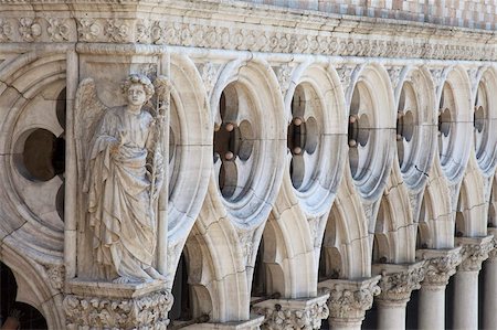 Exterior detail of carving of an angel on the 15th century Palazzo Ducale (Doges Palace), Piazza San Marco (St. Mark's Square), Venice, UNESCO World Heritage Site, Veneto, Italy, Europe Stock Photo - Rights-Managed, Code: 841-03677433