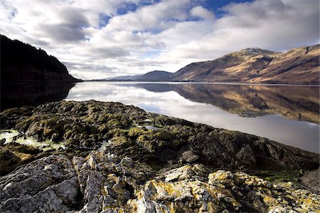 simsearch:841-03672398,k - Winter view of Loch Linnhe in calm weather with reflections of distant mountains and rocky foreshore, near Fort William, Highland, Scotland, United Kingdom, Europe Stock Photo - Rights-Managed, Code: 841-03672403