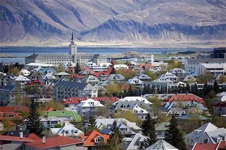 View over Reykjavik with mountains looming in the distance, Reykjavik, Iceland, Polar Regions Stock Photo - Rights-Managed, Code: 841-03672469