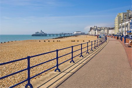 england coast - Pebble beach and groynes, hotels on the seafront promenade, Eastbourne pier in the distance, Eastbourne, East Sussex, England, United Kingdom, Europe Stock Photo - Rights-Managed, Code: 841-03672722