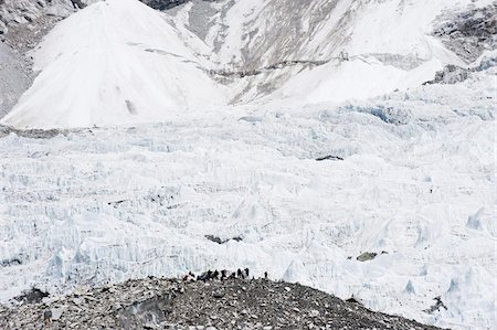 everest base camp nepal - Trekkers below the The Western Cwm glacier at Everest Base Camp, Solu Khumbu Everest Region, Sagarmatha National Park, Himalayas, Nepal, Asia Stock Photo - Rights-Managed, Code: 841-03672821