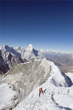 simsearch:841-03031719,k - Climber on summit ridge of Island Peak, 6189m, Ama Dablam, 6812m, Solu Khumbu Everest Region, Sagarmatha National Park, Himalayas, Nepal, Asia Stock Photo - Rights-Managed, Code: 841-03672835