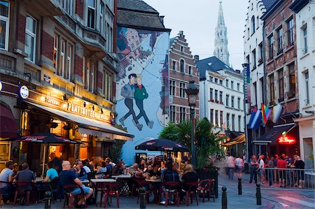 Outdoor cafes and Brousaille wall mural of a couple walking arm in arm, Brussels, Belgium, Europe Stock Photo - Rights-Managed, Code: 841-03673063
