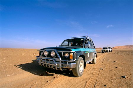 Jeeps driving through desert, Erg Murzuq, Sahara desert, Fezzan, Libya, North Africa, Africa Foto de stock - Con derechos protegidos, Código: 841-03673297