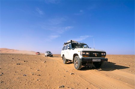 Jeeps driving through desert, Erg Murzuq, Sahara desert, Fezzan, Libya, North Africa, Africa Foto de stock - Con derechos protegidos, Código: 841-03673298
