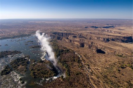 Victoria Falls, UNESCO World Heritage Site, Zambesi River, on the border of Zambia and Zimbabwe, Africa Stock Photo - Rights-Managed, Code: 841-03673399