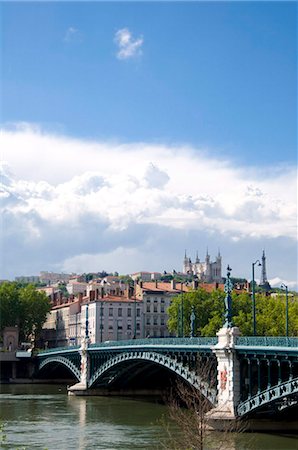 The Pont de l'Universite over the River Rhone and the Lyon skyline, Lyon, France, Europe Stock Photo - Rights-Managed, Code: 841-03867855