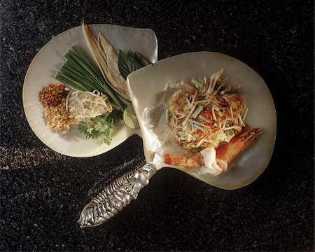 peanut noodles - Thai style noodles (Quittieaw Pat Thai), rice noodles with shrimps, peanuts, lime and, chilli, a popular Thai dish, Thailand, Southeast Asia, Asia Stock Photo - Rights-Managed, Code: 841-03867907