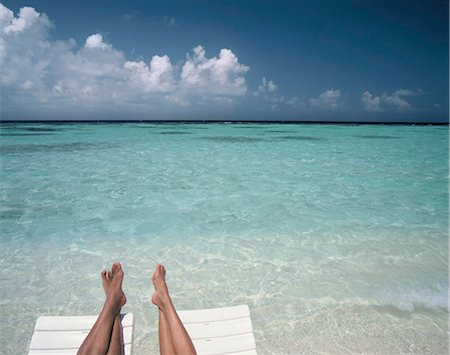 feet lovers - Couple's legs on a beach, Maldives, Indian Ocean, Asia Stock Photo - Rights-Managed, Code: 841-03867916