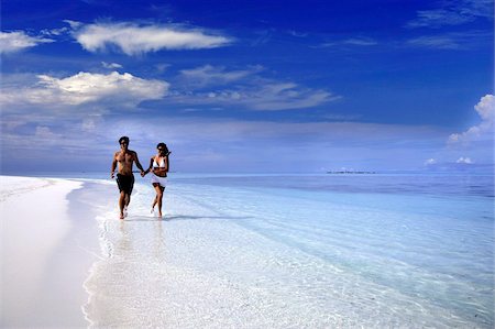 simsearch:841-03867922,k - Couple en cours d'exécution sur une plage, Maldives, océan Indien, Asie Photographie de stock - Rights-Managed, Code: 841-03867918