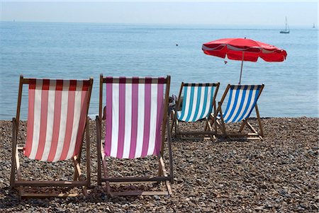 simsearch:841-03029106,k - Coloured deck chairs on the pebble strand, Brighton, Sussex, England, United Kingdom, Europe Foto de stock - Con derechos protegidos, Código: 841-03868136
