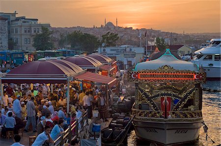 Traditional boats cooking and selling food, Eminonu, Galeta bridge, Istanbul, Turkey, Europe Stock Photo - Rights-Managed, Code: 841-03868243