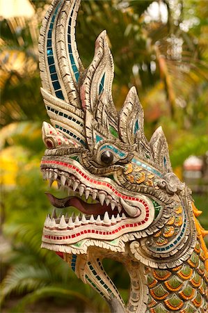dragón - Wat Chai Phra Kiat, Chiang Mai, Chiang Mai Province, Thailand, Southeast Asia, Asia Foto de stock - Con derechos protegidos, Código: 841-03869309