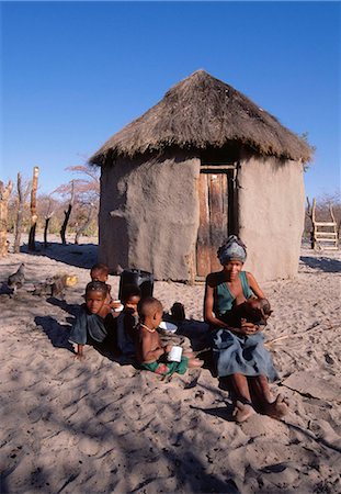 shack child - San !Kung village at the foot of Tsodilo Hills, Ngamiland, Botswana, Africa Stock Photo - Rights-Managed, Code: 841-03869486