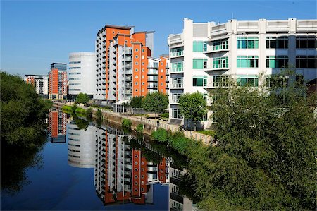 Modern office and apartment buildings beside the River Aire in central Leeds, West Yorkshire, England, United Kingdom, Europe Stock Photo - Rights-Managed, Code: 841-03869723