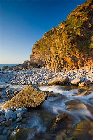 River Heddon flows into the sea at Heddons Mouth, Exmoor National Park, Devon, England, United Kingdom, Europe Foto de stock - Con derechos protegidos, Código: 841-03869857