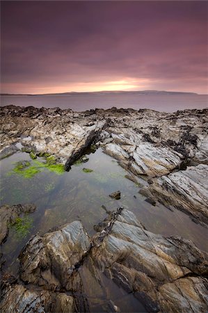 simsearch:841-03870034,k - Rockpool on the rocky shores of Godrevy Point looking across to St. Ives, Cornwall, England, United Kingdom, Europe Stock Photo - Rights-Managed, Code: 841-03869903