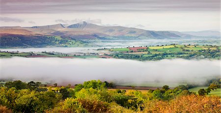 simsearch:841-03869928,k - Overlooking mist covered countryside towards Pen y Fan and the Brecon Beacons mountains, Brecon Beacons National Park, Powys, Wales, United Kingdom. Europe Stock Photo - Rights-Managed, Code: 841-03869915
