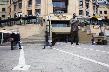 People walking through Nelson Mandela Square, Sandton, Johannesburg, Gauteng, South Africa, Africa Stock Photo - Rights-Managed, Code: 841-03870038