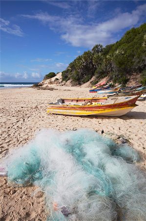 simsearch:862-03807924,k - Fishing boats and nets on beach, Tofo, Inhambane, Mozambique, Africa Stock Photo - Rights-Managed, Code: 841-03870122