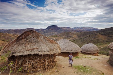 Child standing in village in hills, Eshowe, Zululand, KwaZulu-Natal, South Africa, Africa Foto de stock - Con derechos protegidos, Código: 841-03870146