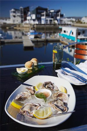 Plate of oysters at restaurant, Thesen's Island, Knysna, Western Cape, South Africa, Africa Foto de stock - Con derechos protegidos, Código: 841-03870159