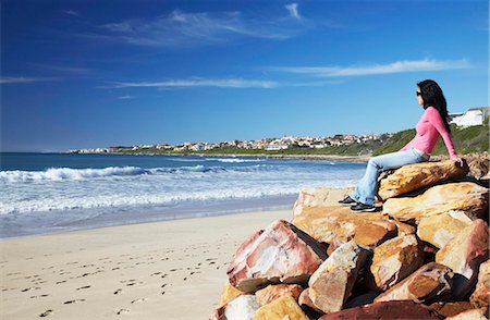 simsearch:841-03868730,k - Woman sitting on rocks at St. Francis Bay, Western Cape, South Africa, Africa Stock Photo - Rights-Managed, Code: 841-03870151