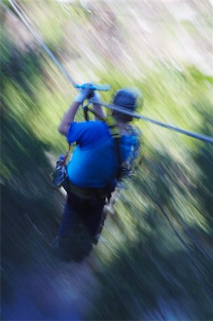eastern cape - Man sliding down a zip-line, Storms River, Eastern Cape, South Africa, Africa Stock Photo - Rights-Managed, Code: 841-03870171