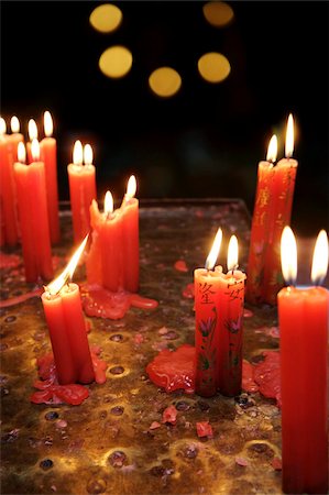 Candle offerings in Buddhist temple, Ho Chi Minh City, Vietnam, Indochina, Southeast Asia, Asia Stock Photo - Rights-Managed, Code: 841-03870721