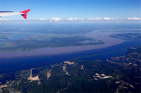 View over the water line, at the junction of Rio Negro and Rio Amazonia, Amazon, Brazil, South America Stock Photo - Rights-Managed, Code: 841-03870764