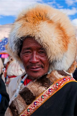 Homme en costume traditionnel au festival, Gerze, Tibet, Chine, Asie Photographie de stock - Rights-Managed, Code: 841-03870932