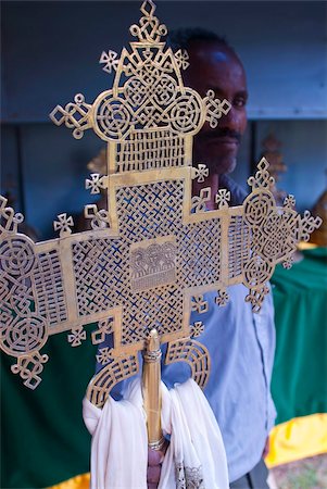 Orthodox monk standing behind a Christian cross, Axum, Ethiopia, Africa Stock Photo - Rights-Managed, Code: 841-03871061