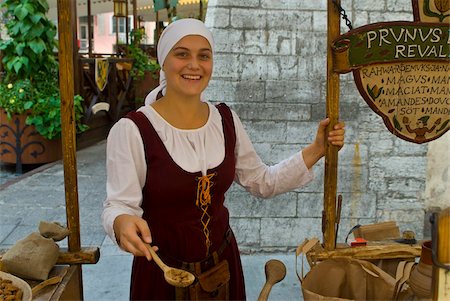 estonia - Traditionally dressed girl selling stuff from the Middle Ages, Tallinn, Estonia, Baltic States, Europe Stock Photo - Rights-Managed, Code: 841-03871231