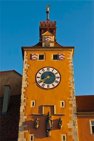 photo of unesco world heritage sites in regensburg - Clock tower on the end of the famous stone bridge, Regensburg, UNESCO World Heritage Site, Bavaria, Germany, Europe Stock Photo - Rights-Managed, Code: 841-03871273