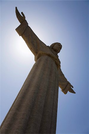 statues in portugal - The Christus Rei statue, a depiction of Jesus Christ with outstretched arms, in Lisbon, Portugal, Europe Stock Photo - Rights-Managed, Code: 841-03871395