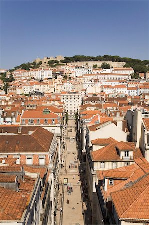 european street view - The tiled roofs of the central Baixa District run towards the Castle of St George (Castelo Sao Jorge), Lisbon, Portugal, Europe Stock Photo - Rights-Managed, Code: 841-03871404