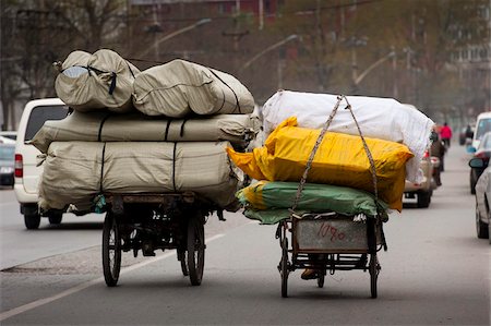 Tricycles à côté de Muxiyuan textiles sur les marchés, Fengtai District, Beijing, Chine, Asie Photographie de stock - Rights-Managed, Code: 841-03871439