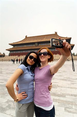 Tourists taking their own photograph in front of the Hall for Worship Of Ancestors, The Forbidden City, Beijing, China, Asia Stock Photo - Rights-Managed, Code: 841-03871472