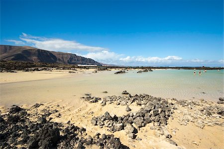 Bajo de los Sables beach near Orzola at the north east tip of the island, Lanzarote, Canary Islands Spain, Atlantic, Europe Stock Photo - Rights-Managed, Code: 841-03871612