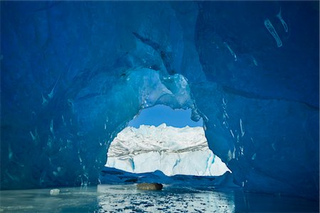 passage - View from inside an ice cave of an iceberg frozen in Mendenhall Lake, Juneau, Southeast Alaska, Winter Stock Photo - Rights-Managed, Code: 854-05974171